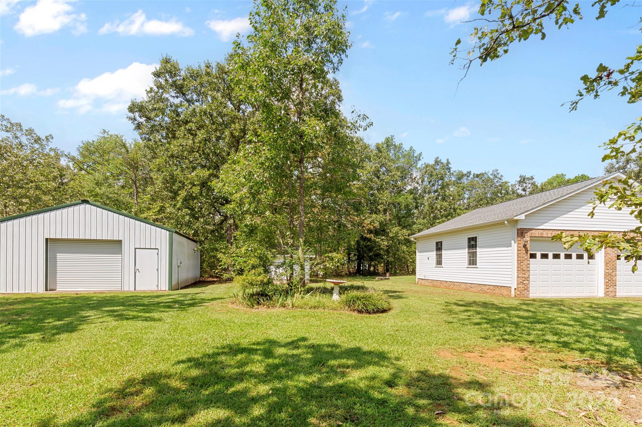 1220 Shiloh Ranch Road Lancaster, SC 29720 - Photo 4 of 35 a view of a house with a yard