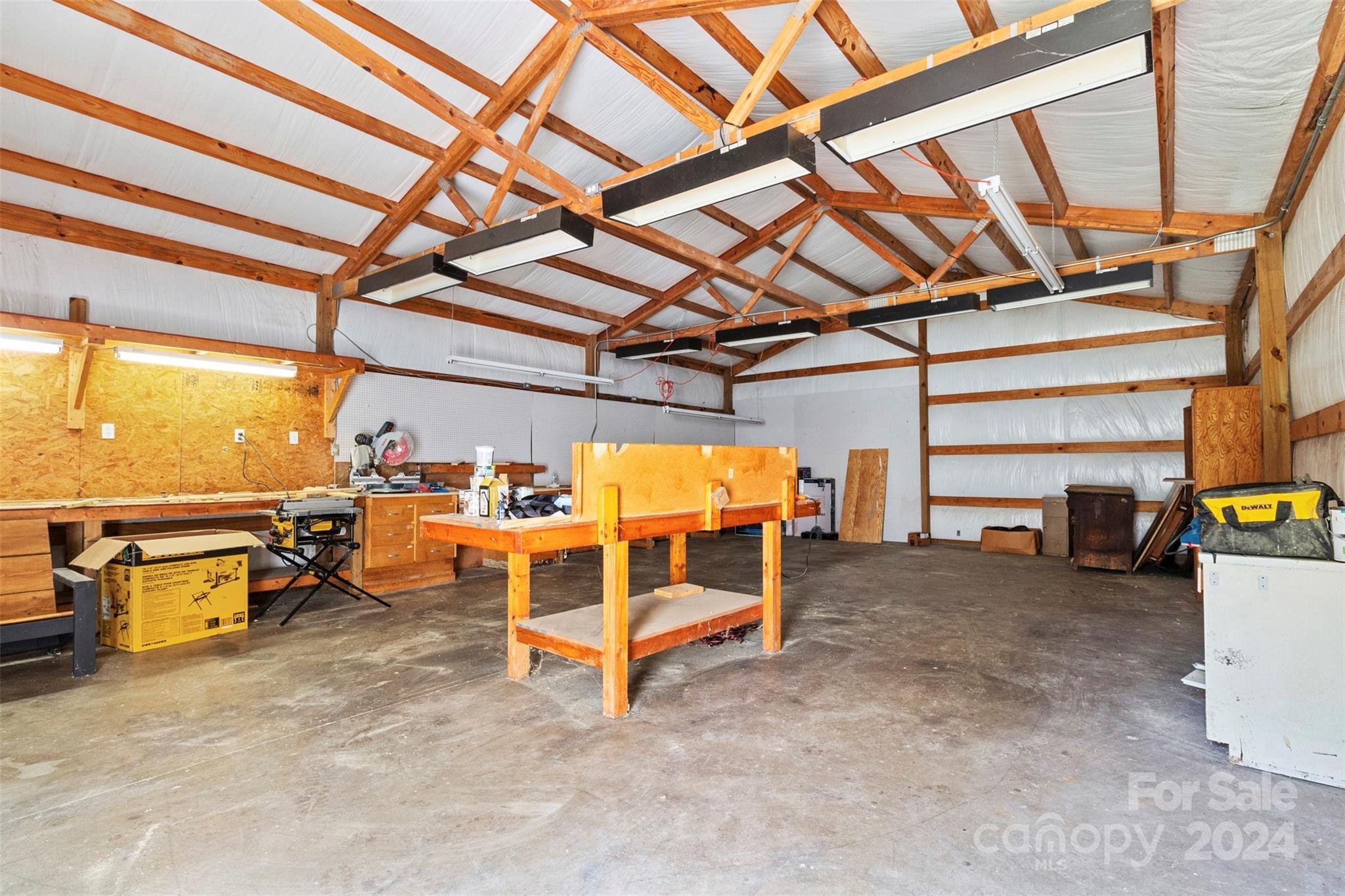 1220 Shiloh Ranch Road Lancaster, SC 29720 - Photo 6 of 35 a view of a room with wooden walls