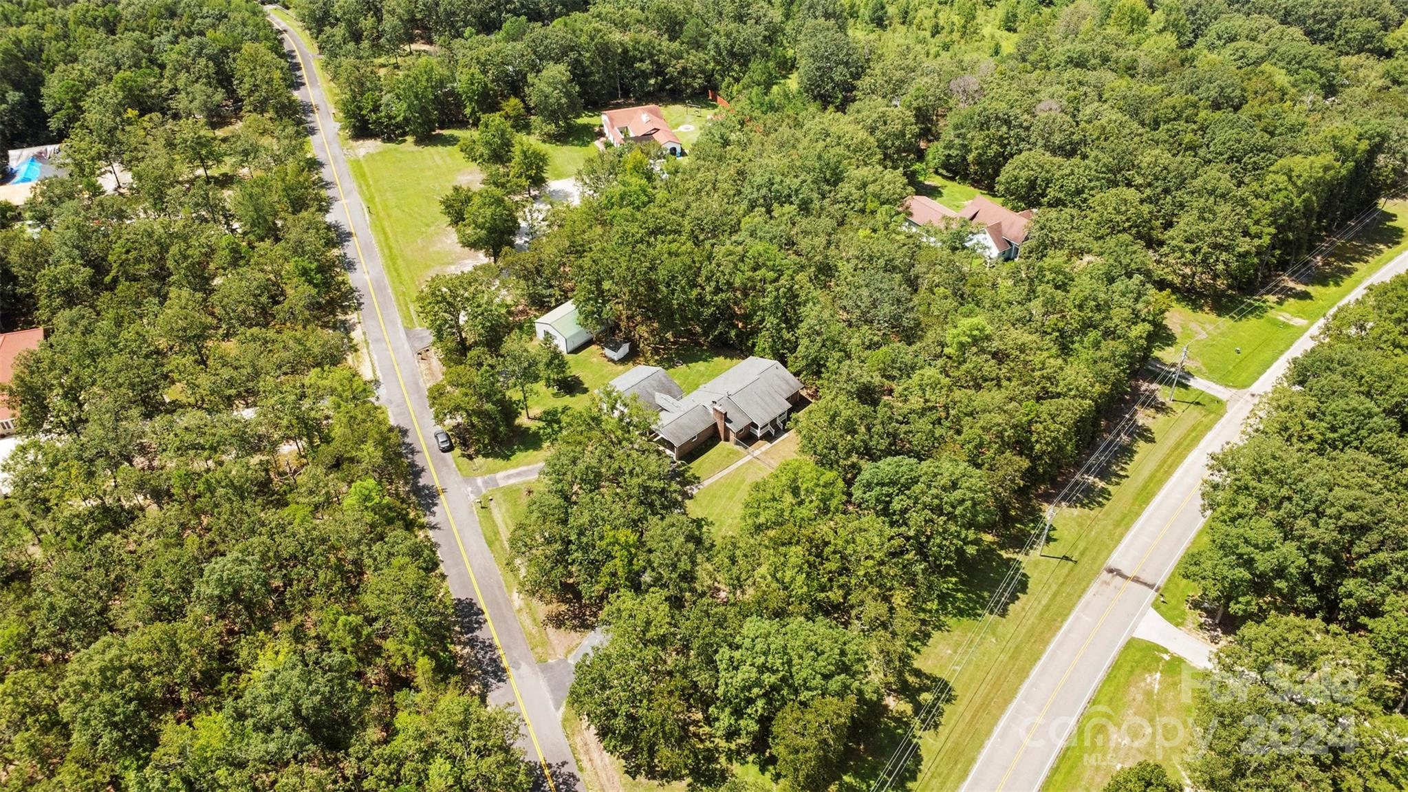 1220 Shiloh Ranch Road Lancaster, SC 29720 - Photo 7 of 35 a view of a yard and trees