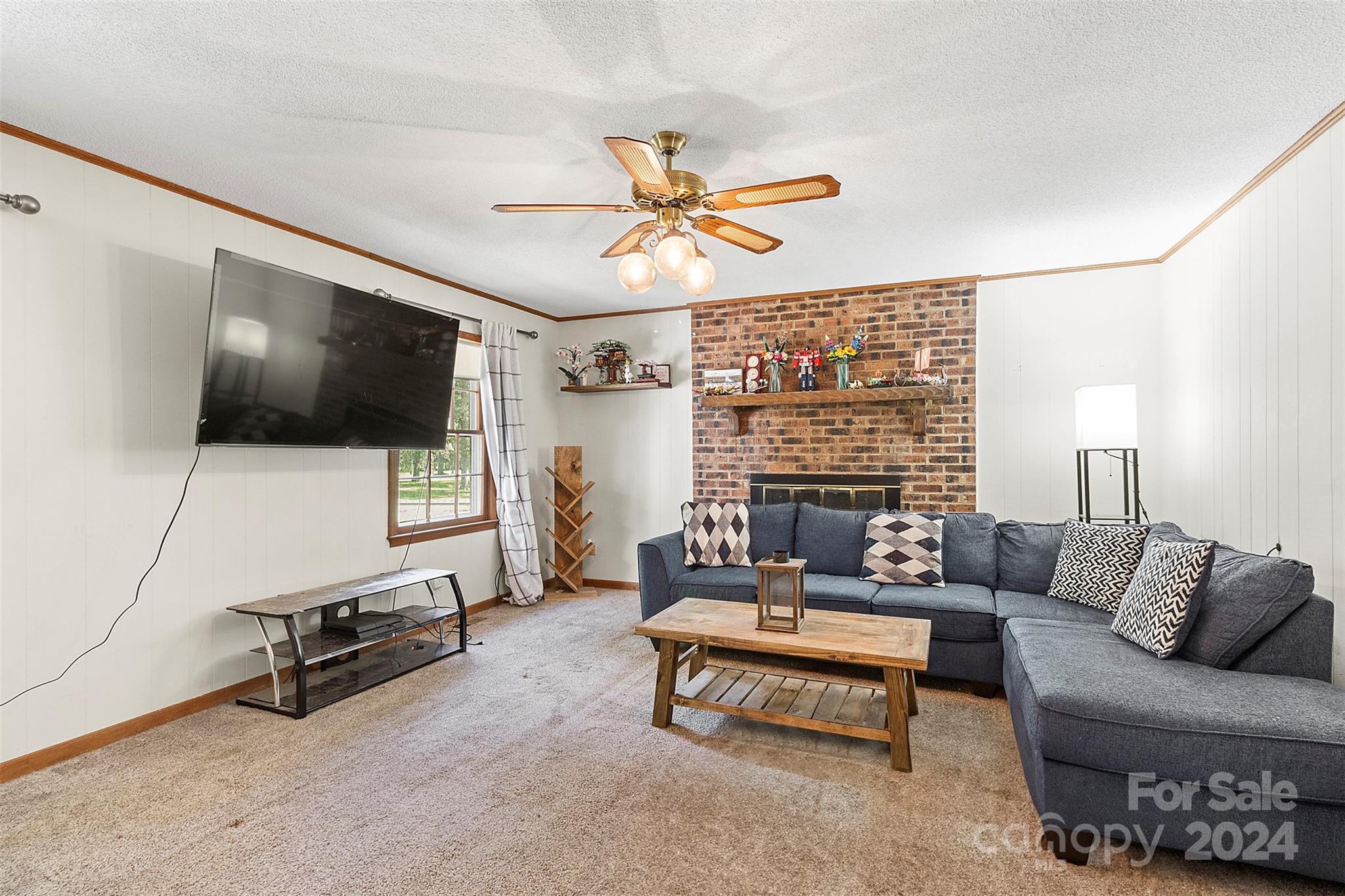 1220 Shiloh Ranch Road Lancaster, SC 29720 - Photo 8 of 35 a living room with furniture and a flat screen tv