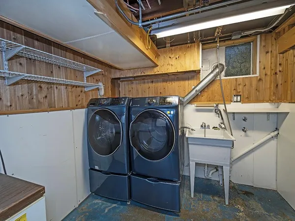 a utility room with dryer and washer