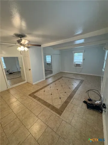 a view of a livingroom with furniture