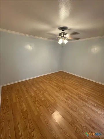 a view of a big room with carpet