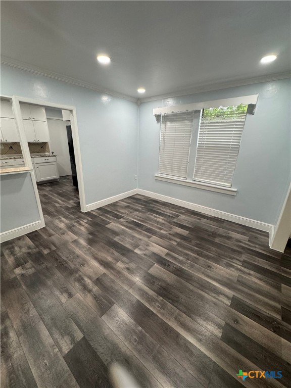 1705 Holly Street Austin, TX 78702 - Photo 6 of 21 a view of empty room with wooden floor