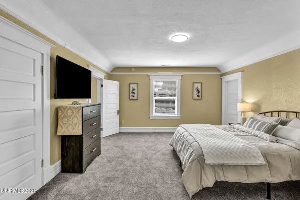 a bathroom with a sink vanity and a mirror