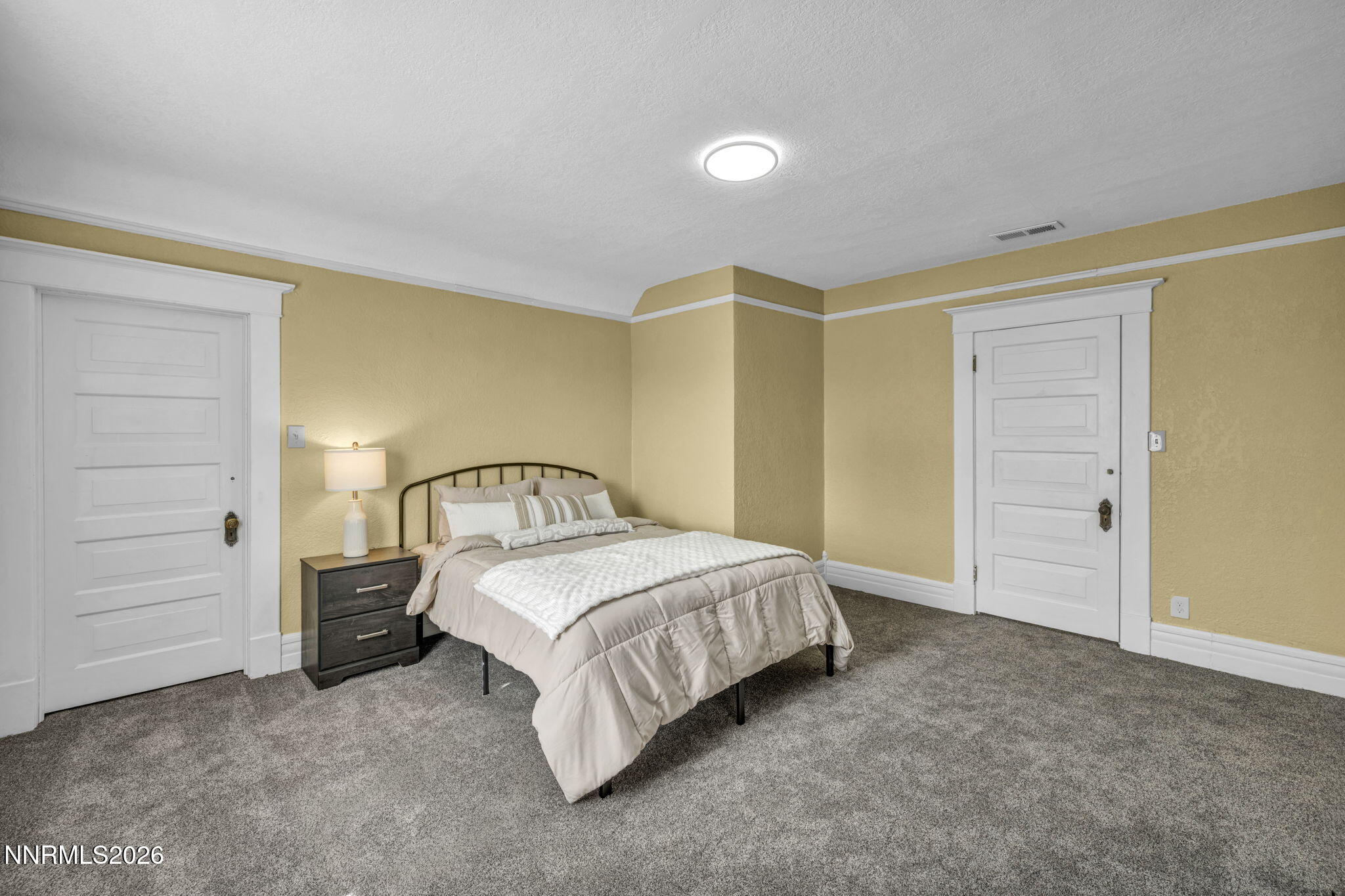 35 West 8th Street Reno, NV 89503 - Photo 24 of 62 a bedroom with a bed and cabinet
