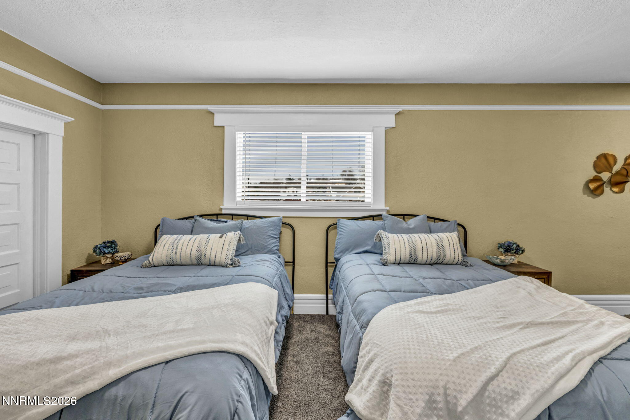 35 West 8th Street Reno, NV 89503 - Photo 47 of 62 a bedroom with two beds and a window
