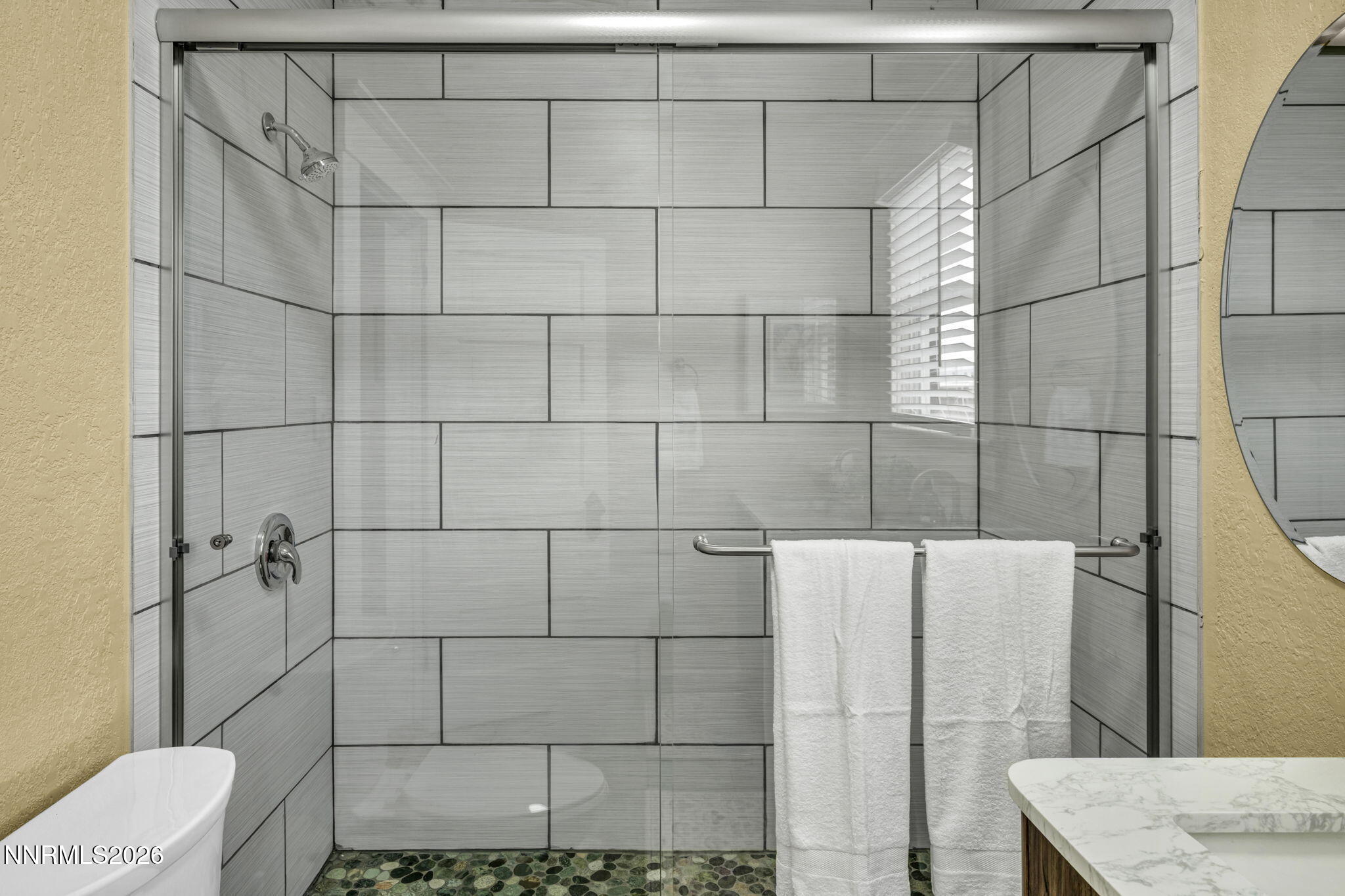 35 West 8th Street Reno, NV 89503 - Photo 51 of 62 a bathroom with a toilet and a shower