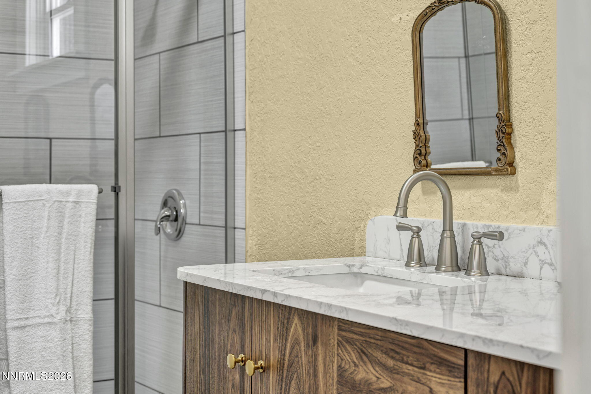 35 West 8th Street Reno, NV 89503 - Photo 52 of 62 a bathroom with a sink and a mirror