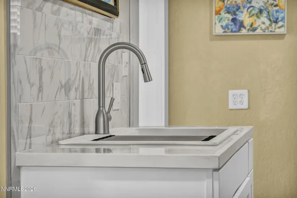 a vase of flowers sitting on a table