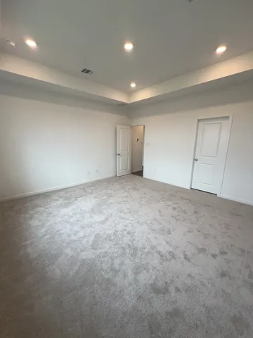 an empty room with an entryway