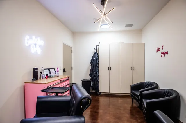 a room with furniture and gym equipment