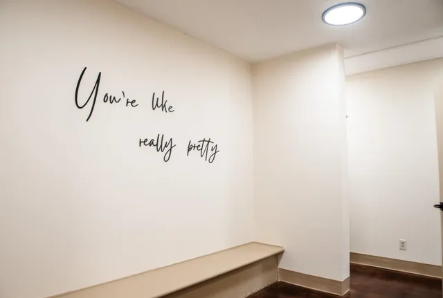 a view of a room with rack on the wall