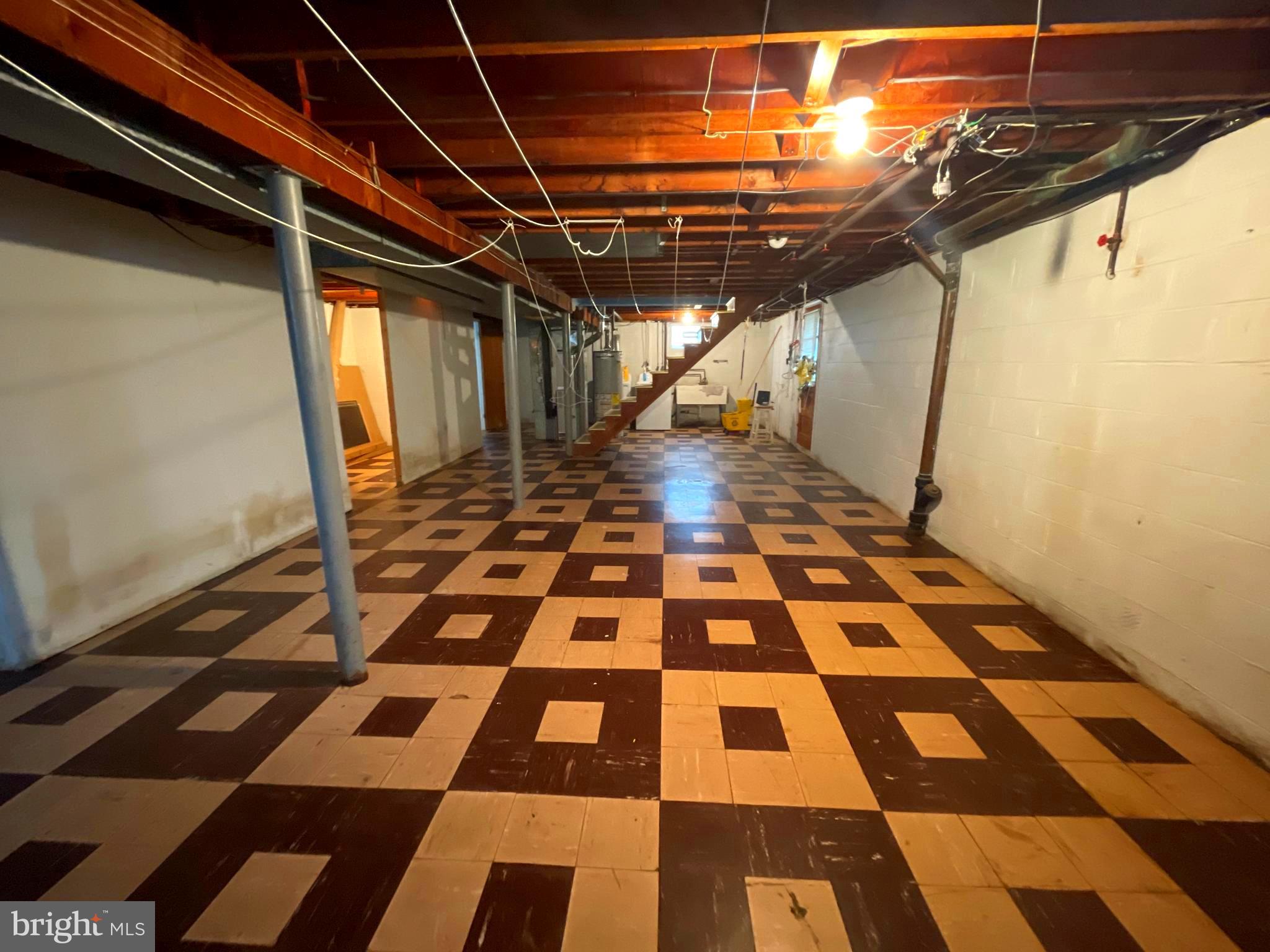 6804 Lenbern Road Baltimore, MD 21207 - Photo 13 of 17 a picture of a black and white checkered floor