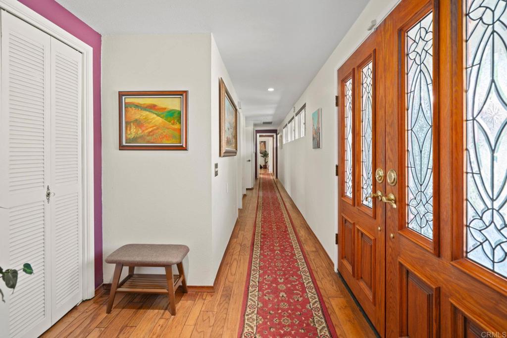3519 Cherrybrook Court Fallbrook, CA 92028 - Photo 9 of 66 43' HALLWAY WITH HARDWOOD FLOORING!