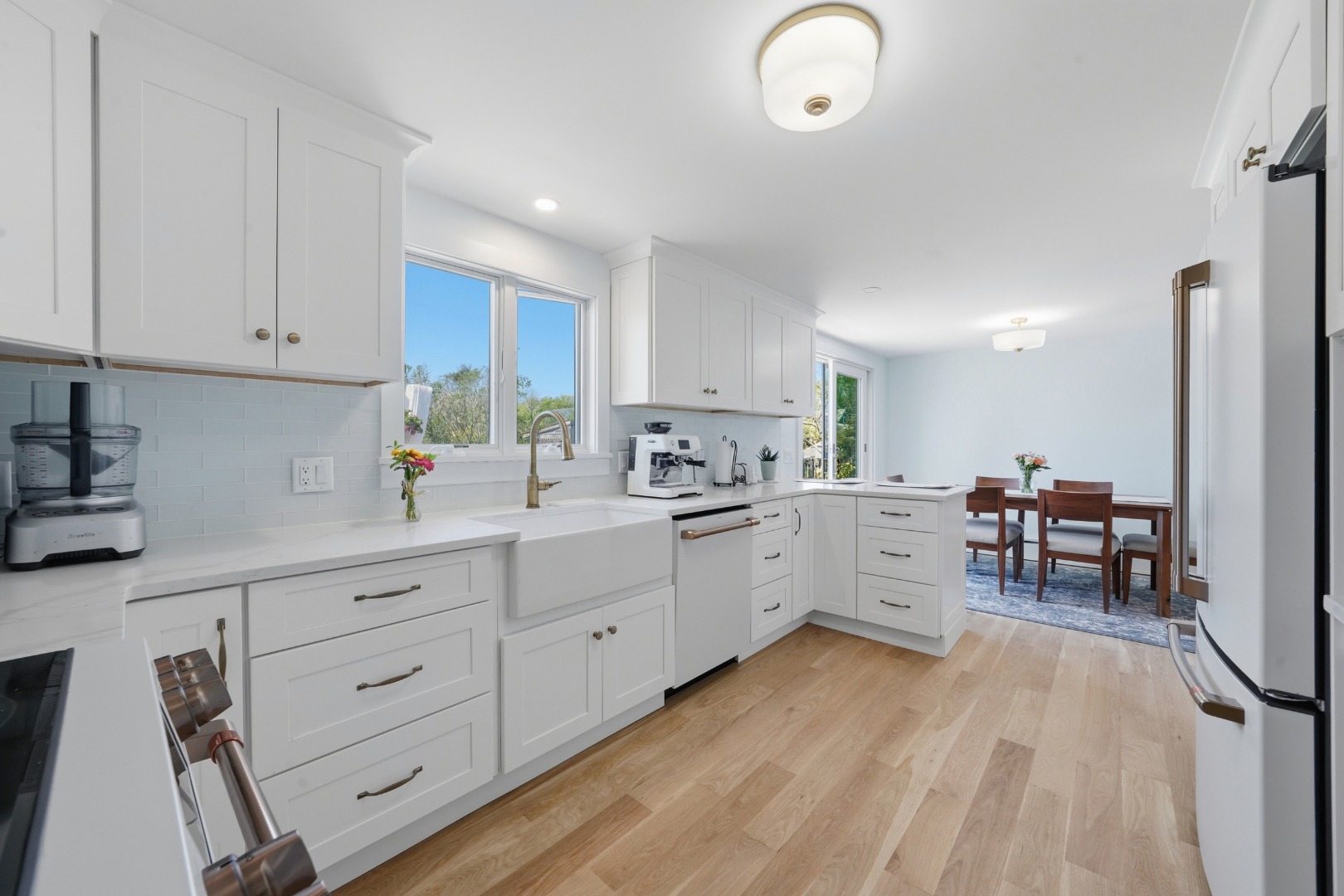 3 Newtown Road Nantucket, MA 02554 - Photo 5 of 20 a kitchen with cabinets table and chairs