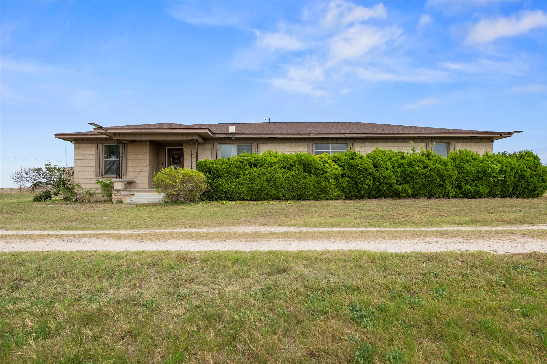 2915 County Road 153 Georgetown, TX 78626 - Photo 2 of 24 a front view of a house with a yard