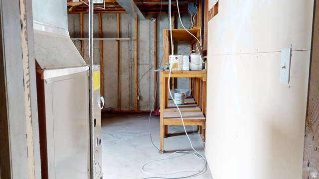 1348 Sagewood Road Price, UT 84501 - Photo 31 of 34 Unfinished below grade area featuring heating unit