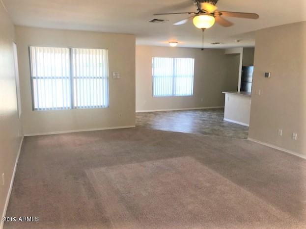 11829 West Wethersfield Road El Mirage, AZ 85335 - Photo 4 of 24 L Great Room 1