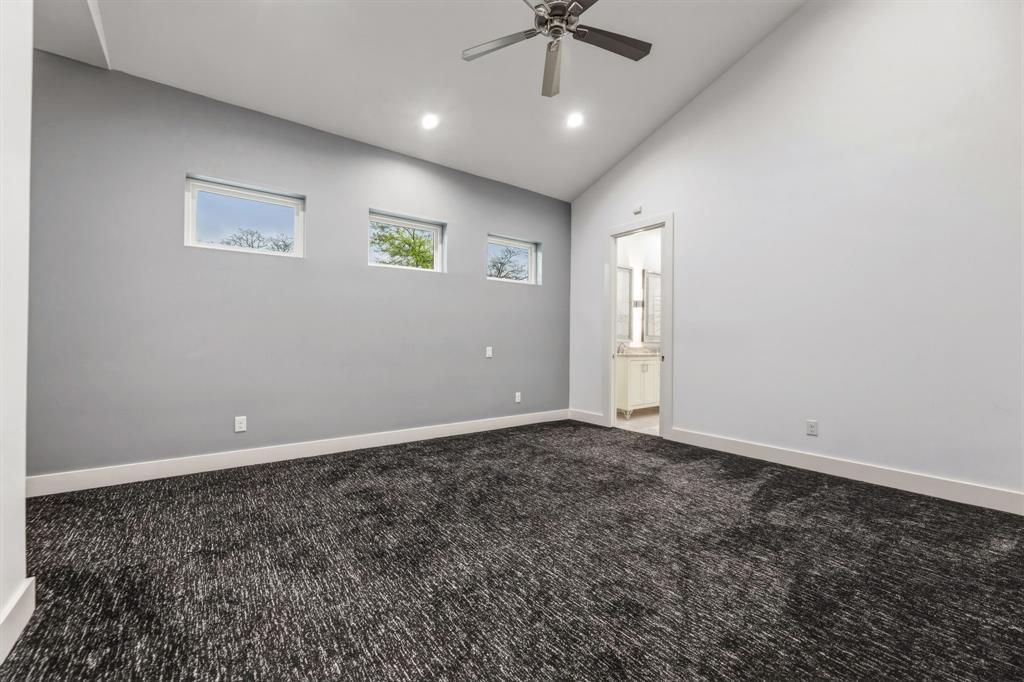 1515 North Fielder Road Arlington, TX 76012 - Photo 26 of 35 an empty room with windows and fan