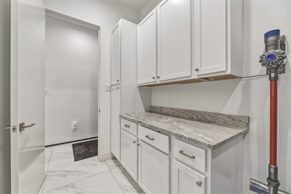 1515 North Fielder Road Arlington, TX 76012 - Photo 35 of 35 a kitchen with white cabinets and a sink