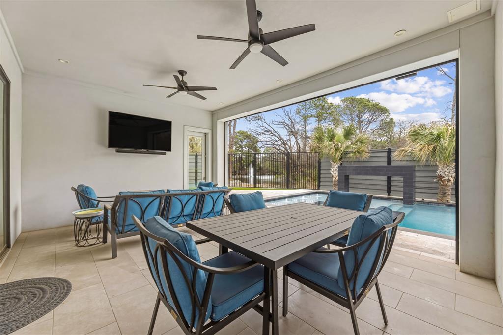 1515 North Fielder Road Arlington, TX 76012 - Photo 7 of 35 a view of a livingroom with furniture and a flat screen tv
