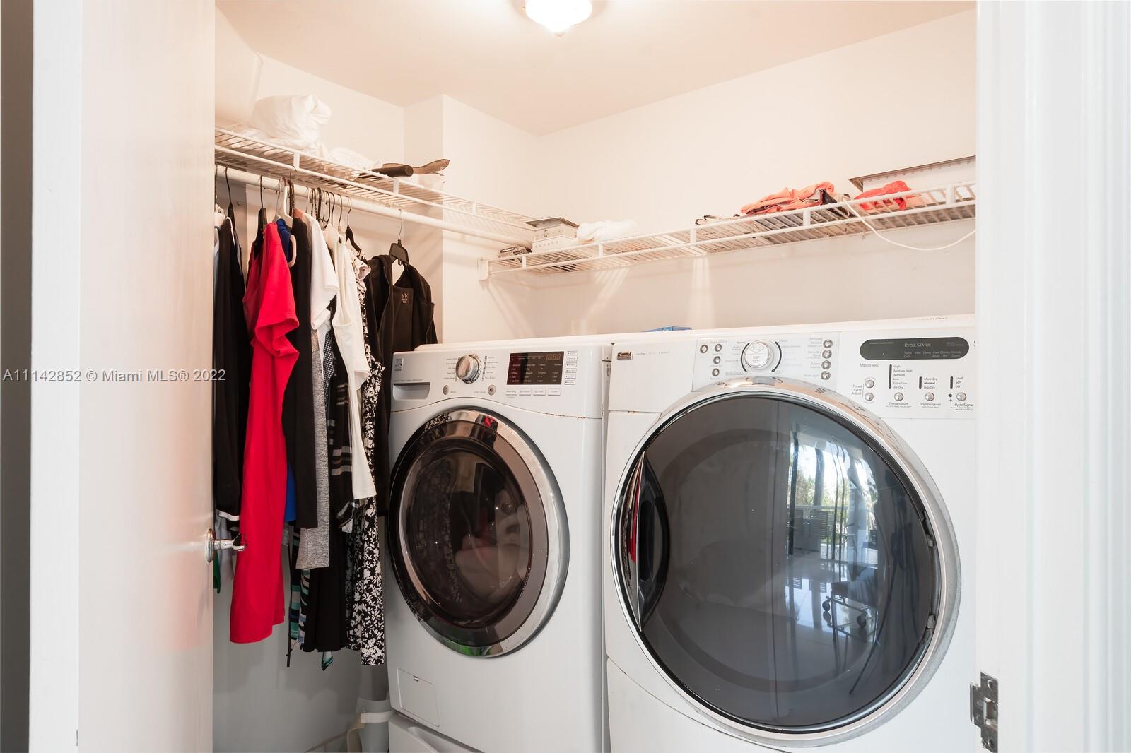 Aventura Aventura, FL 33180 - Photo 28 of 29 a view of a storage & utility room with a washer and dryer
