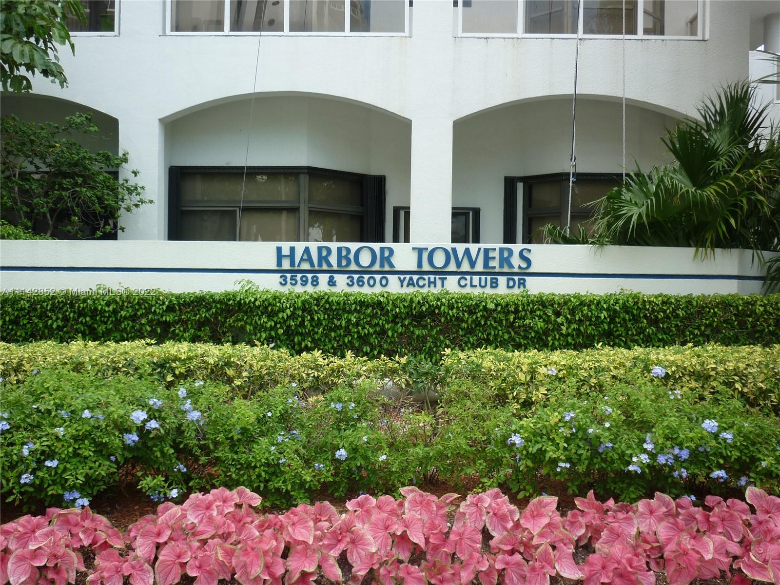 Aventura Aventura, FL 33180 - Photo 9 of 29 a front view of a house with a yard