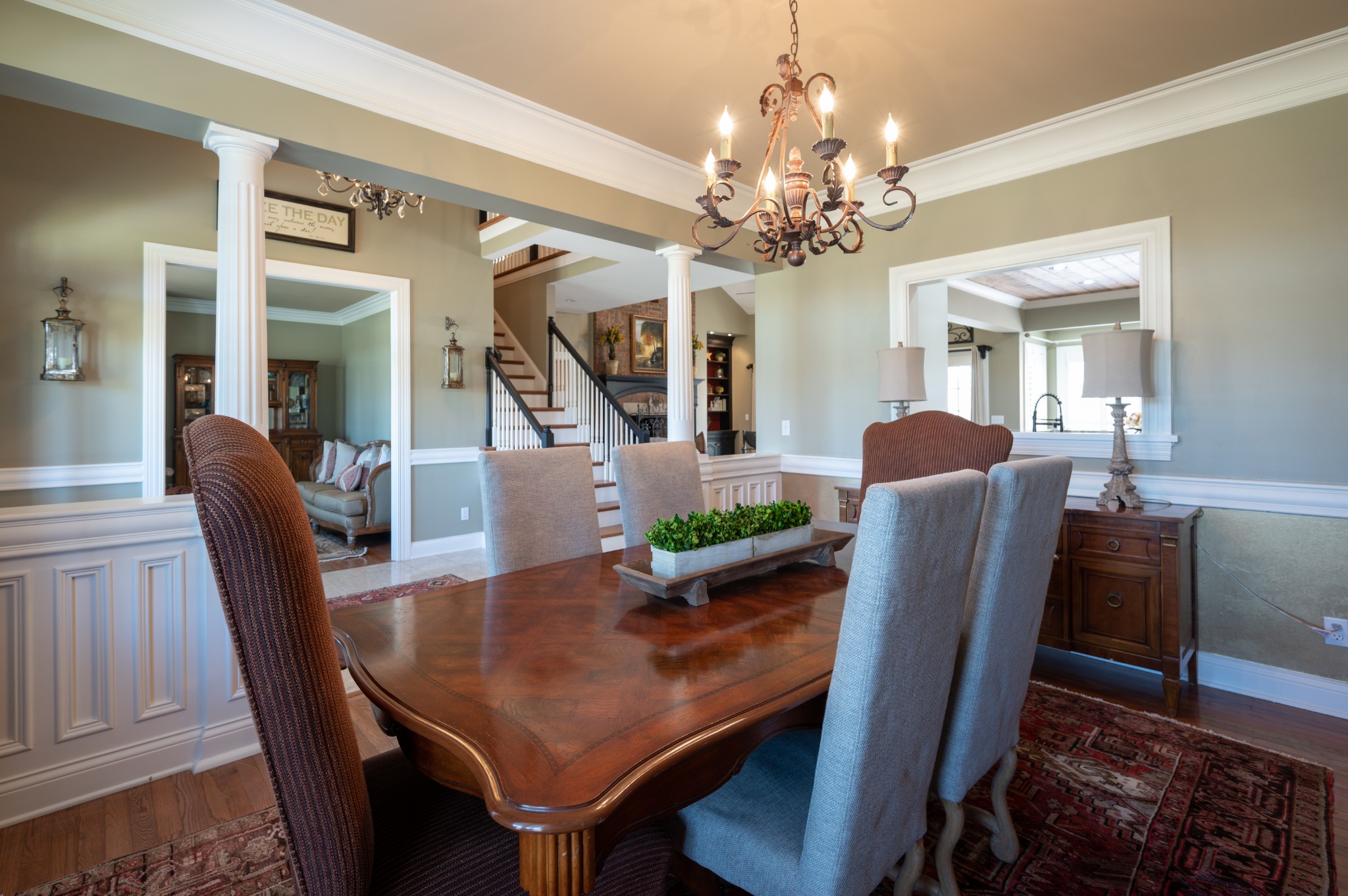 4335 North Chapel Road Franklin, TN 37067 - Photo 14 of 55 a view of a dining room with furniture a chandelier and wooden floor