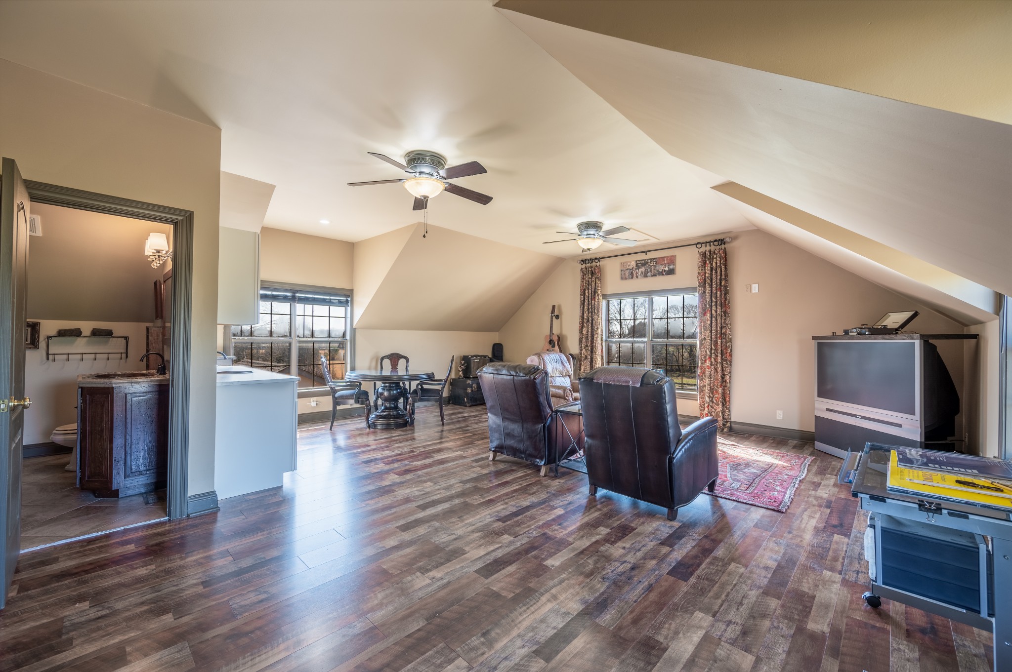4335 North Chapel Road Franklin, TN 37067 - Photo 44 of 55 a living room with furniture and a flat screen tv