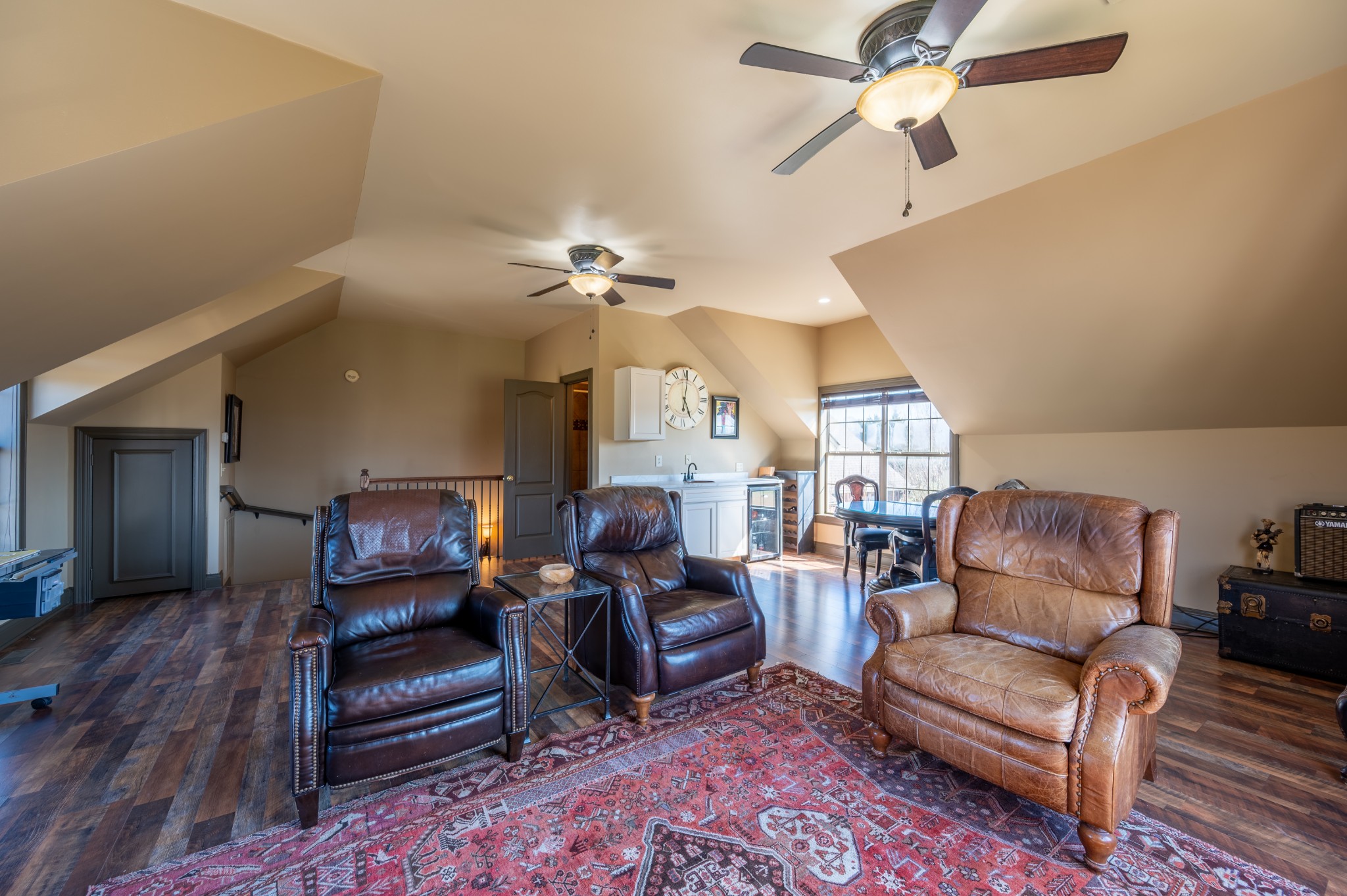 4335 North Chapel Road Franklin, TN 37067 - Photo 45 of 55 a living room with furniture a ceiling fan and a rug
