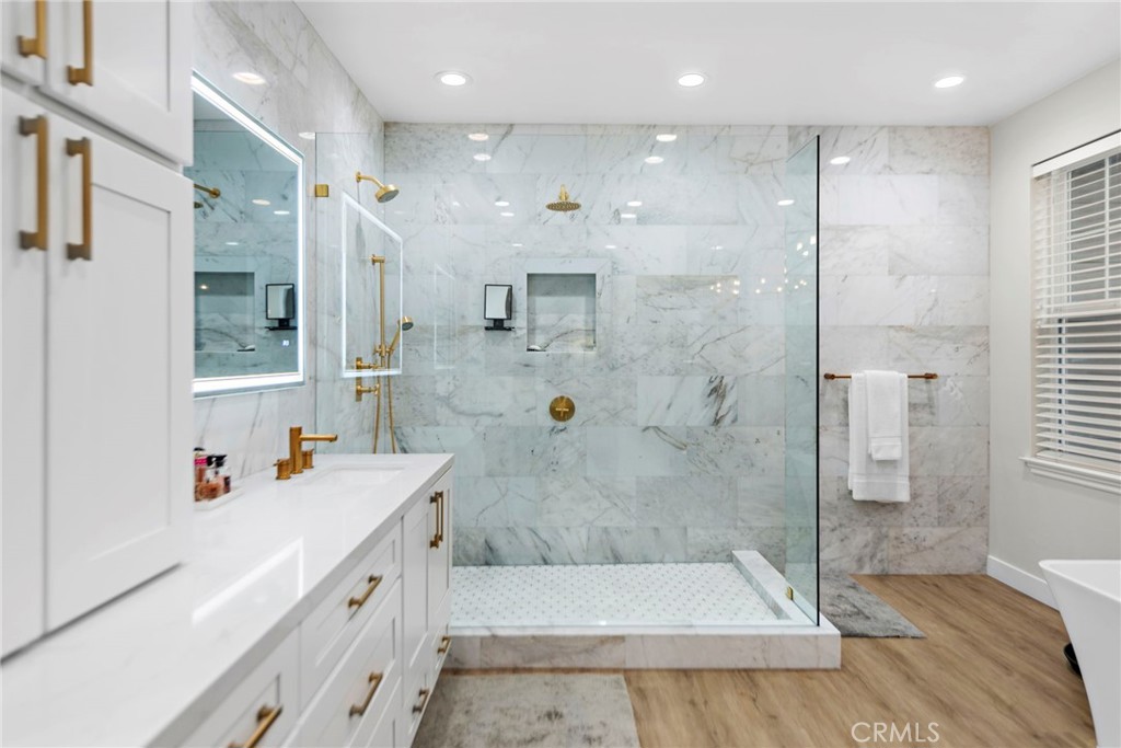 20 Becker Drive Ladera Ranch, CA 92694 - Photo 22 of 47 a bathroom with a sink a toilet and shower