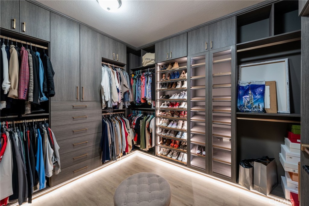 20 Becker Drive Ladera Ranch, CA 92694 - Photo 25 of 47 a view of walk in closet with clothes