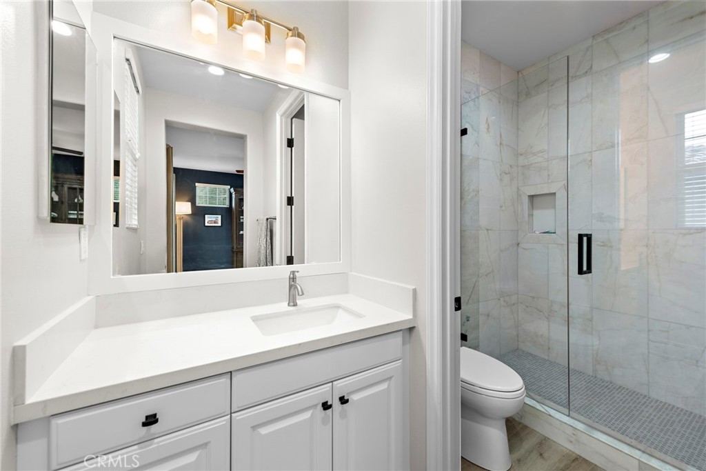 20 Becker Drive Ladera Ranch, CA 92694 - Photo 30 of 47 a bathroom with a sink a toilet and shower