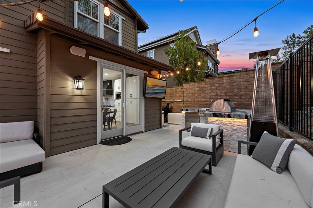 20 Becker Drive Ladera Ranch, CA 92694 - Photo 38 of 47 a view of a patio with couches chairs and a potted plant