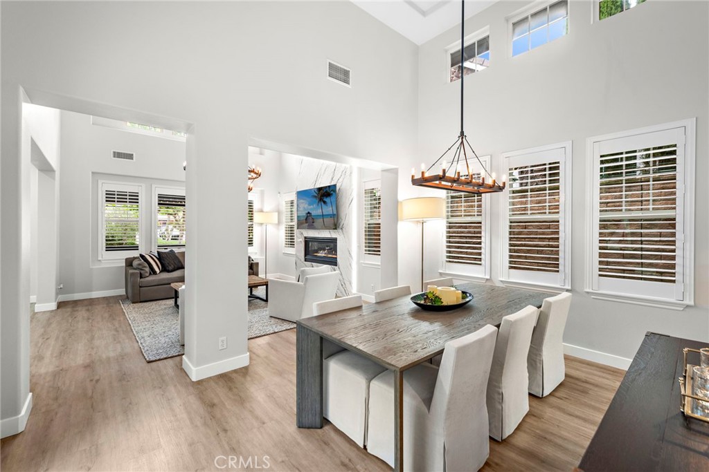 20 Becker Drive Ladera Ranch, CA 92694 - Photo 10 of 47 a view of a dining room with furniture window and wooden floor