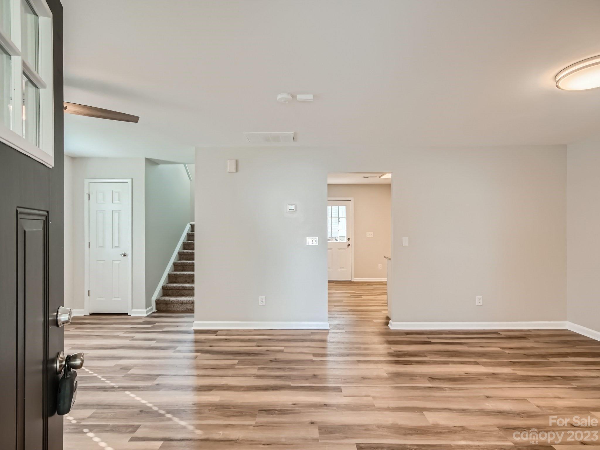 6608 Love Ridge Lane Charlotte, NC 28213 - Photo 5 of 28 a view of a livingroom with wooden floor
