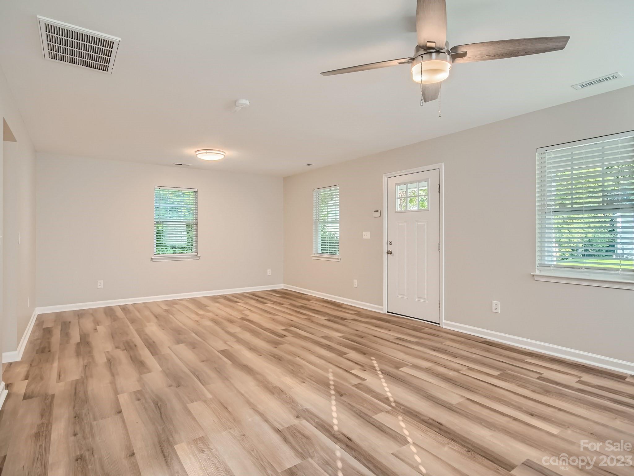 6608 Love Ridge Lane Charlotte, NC 28213 - Photo 7 of 28 a view of empty room with windows