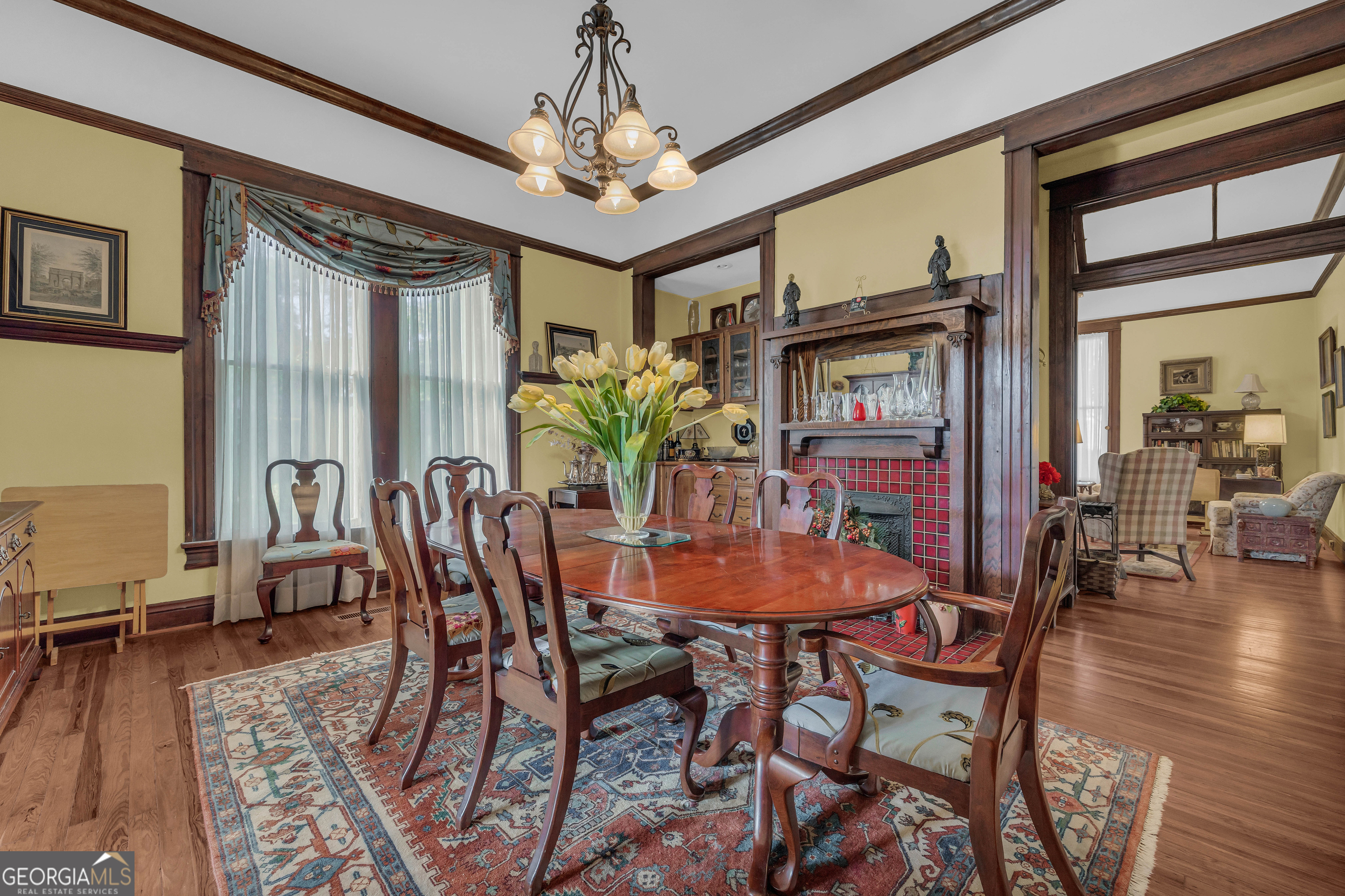 105 South Thomas Street Elberton, GA 30635 - Photo 26 of 57 a view of a dining room with furniture window and wooden floor