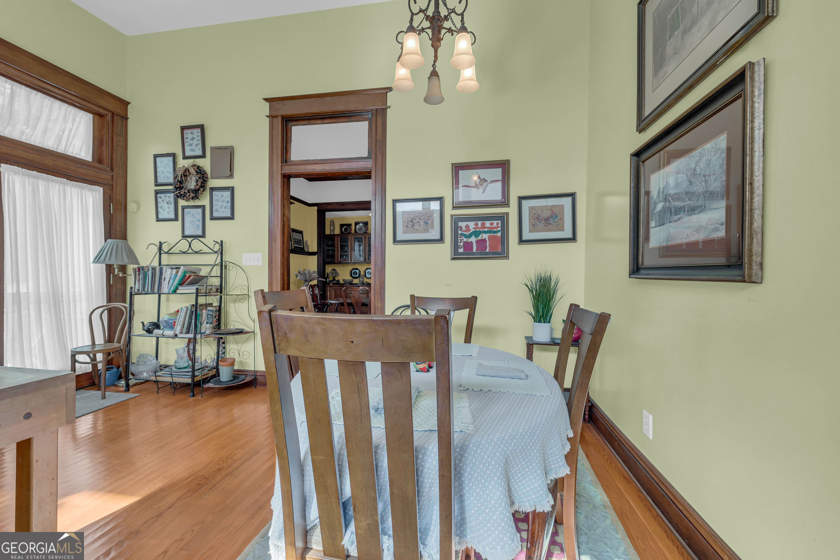 105 South Thomas Street Elberton, GA 30635 - Photo 30 of 57 a view of a livingroom with wooden floor and furniture