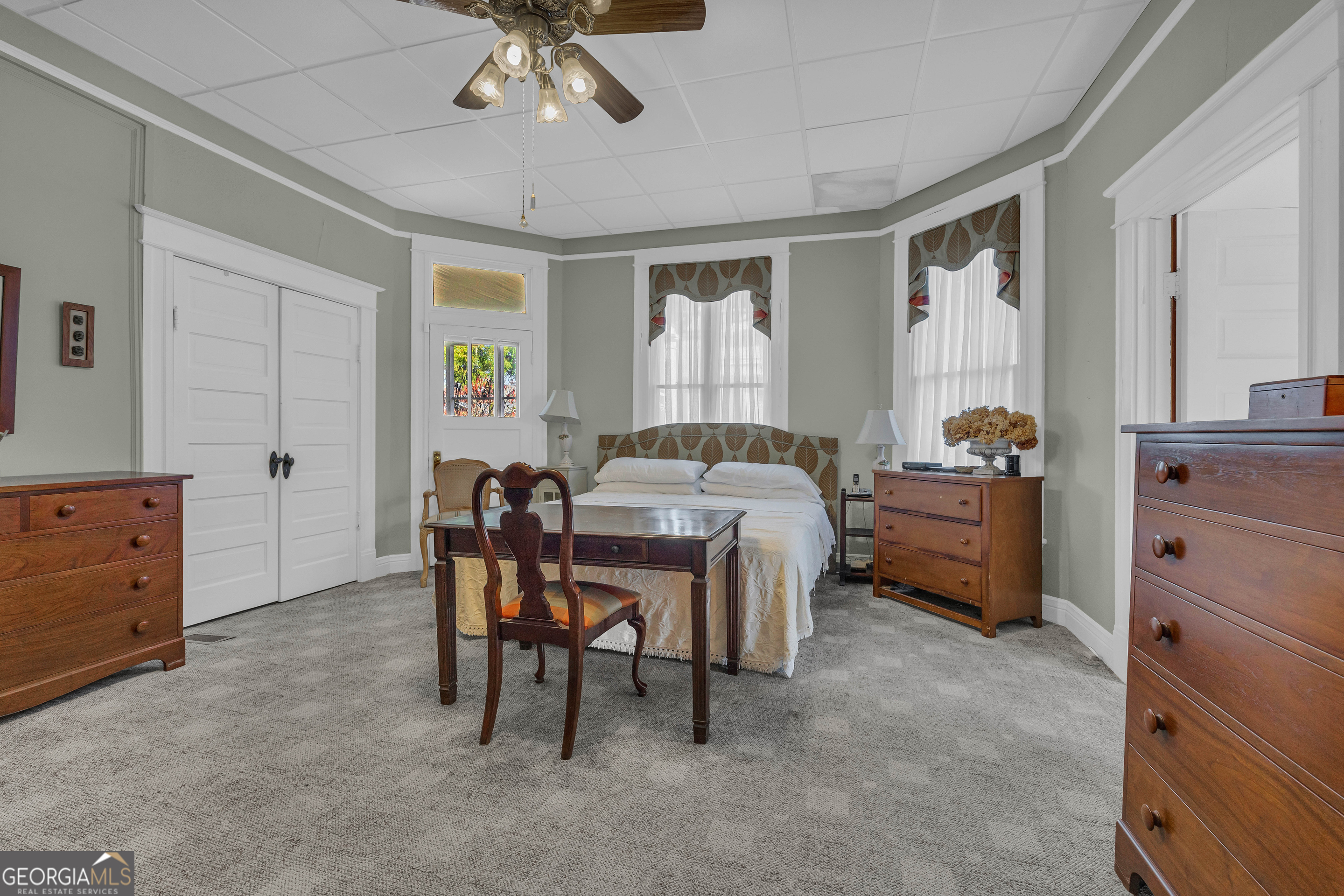 105 South Thomas Street Elberton, GA 30635 - Photo 36 of 57 a bed room with a bed and a dresser