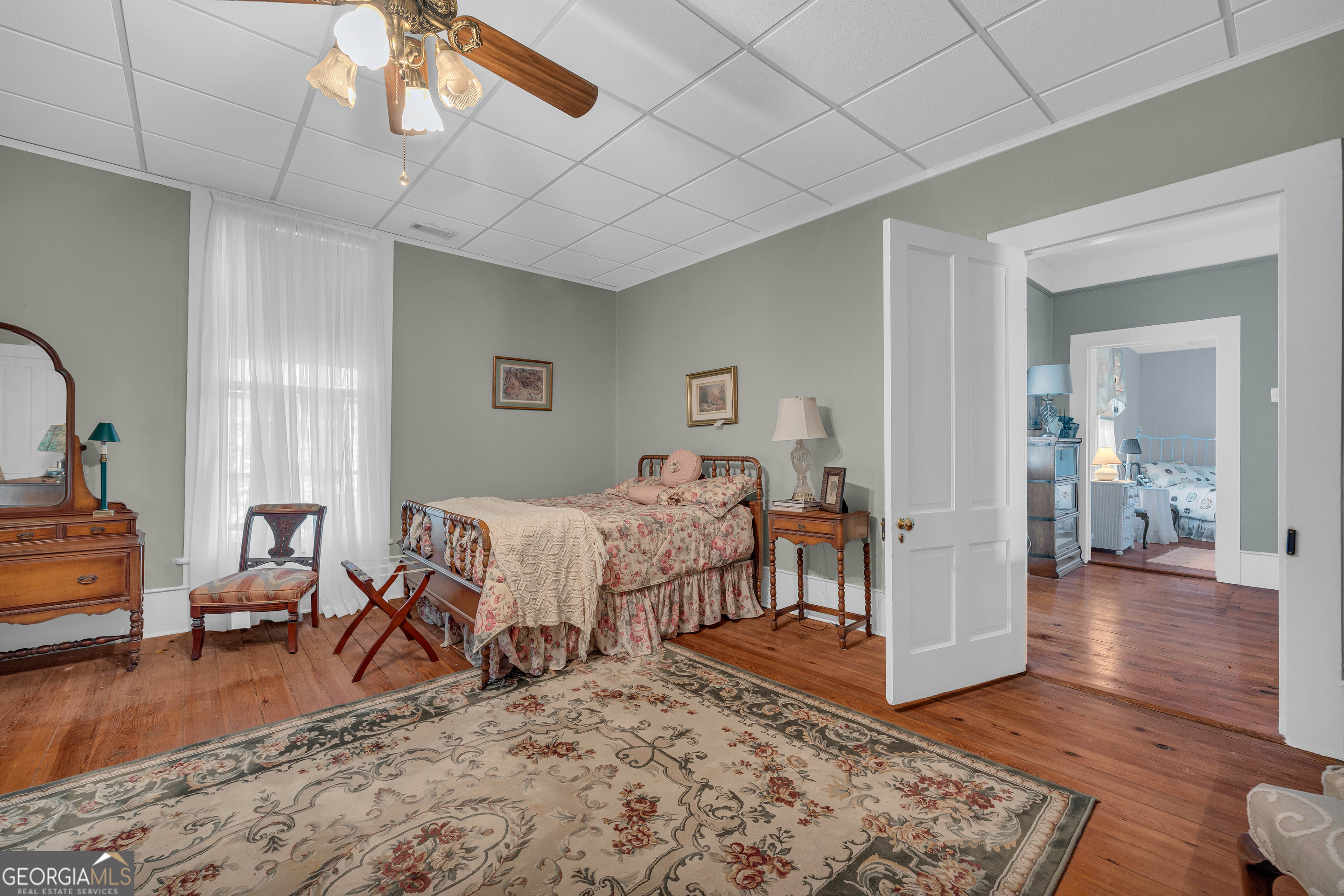 105 South Thomas Street Elberton, GA 30635 - Photo 46 of 57 a bedroom with furniture and wooden floor