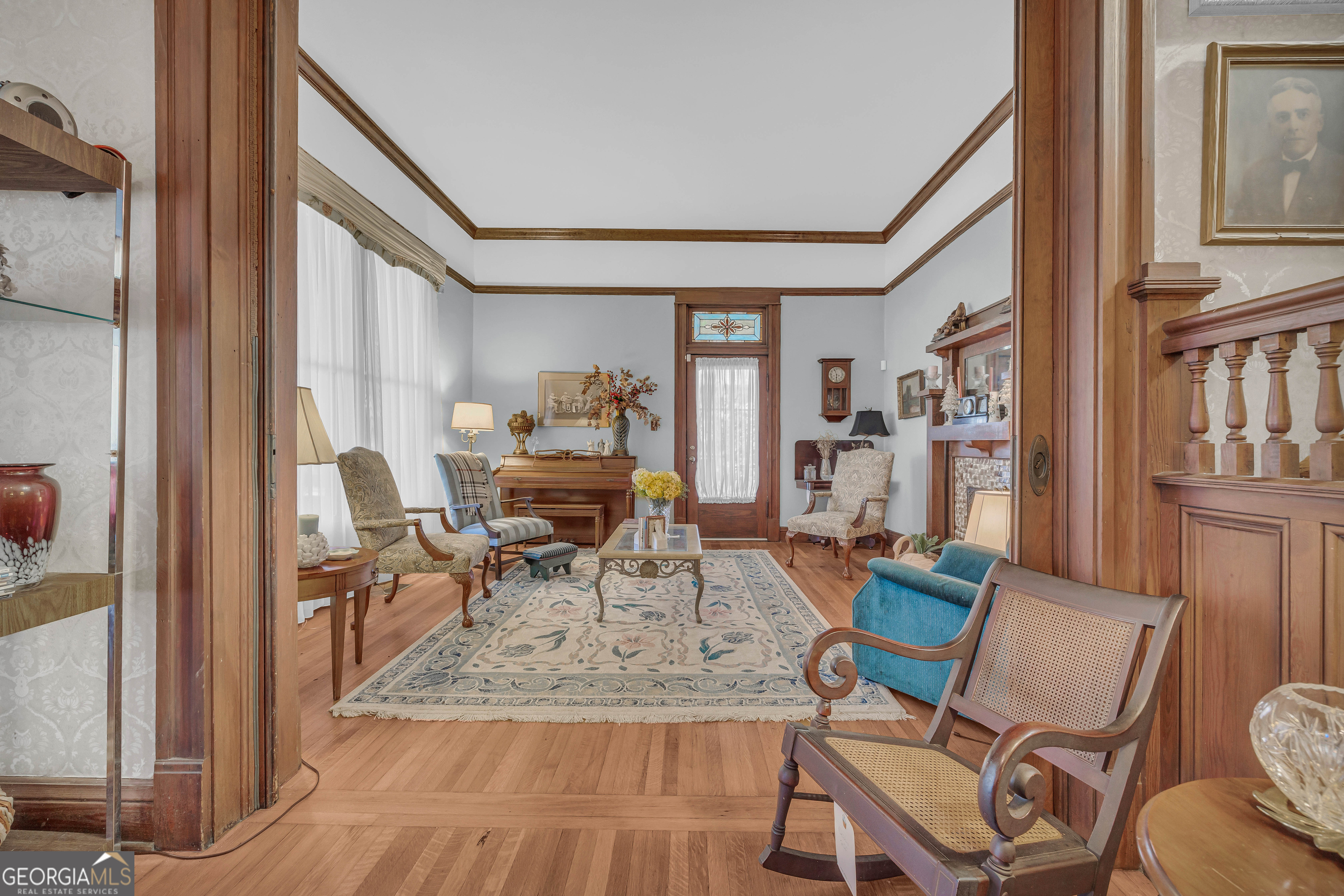 105 South Thomas Street Elberton, GA 30635 - Photo 8 of 57 a living room with furniture and a floor to ceiling window