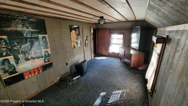 a view of entryway and livingroom