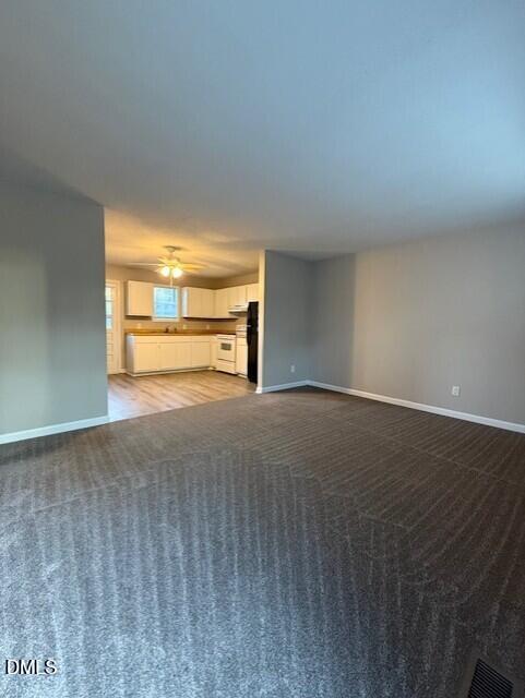 737 North Main Street Wake Forest, NC 27587 - Photo 2 of 11 a view of empty room with wooden floor