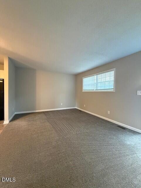 737 North Main Street Wake Forest, NC 27587 - Photo 3 of 11 an empty room with a window
