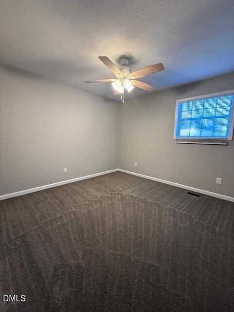 737 North Main Street Wake Forest, NC 27587 - Photo 9 of 11 an empty room with a window and ceiling fan