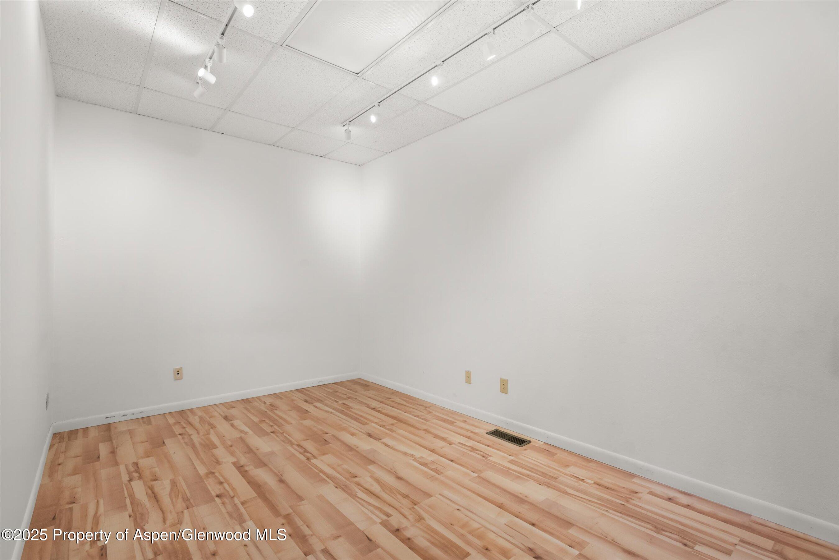 207 Basalt Center Circle, Unit 104 Basalt, CO 81621 - Photo 11 of 13 wooden floor in a room