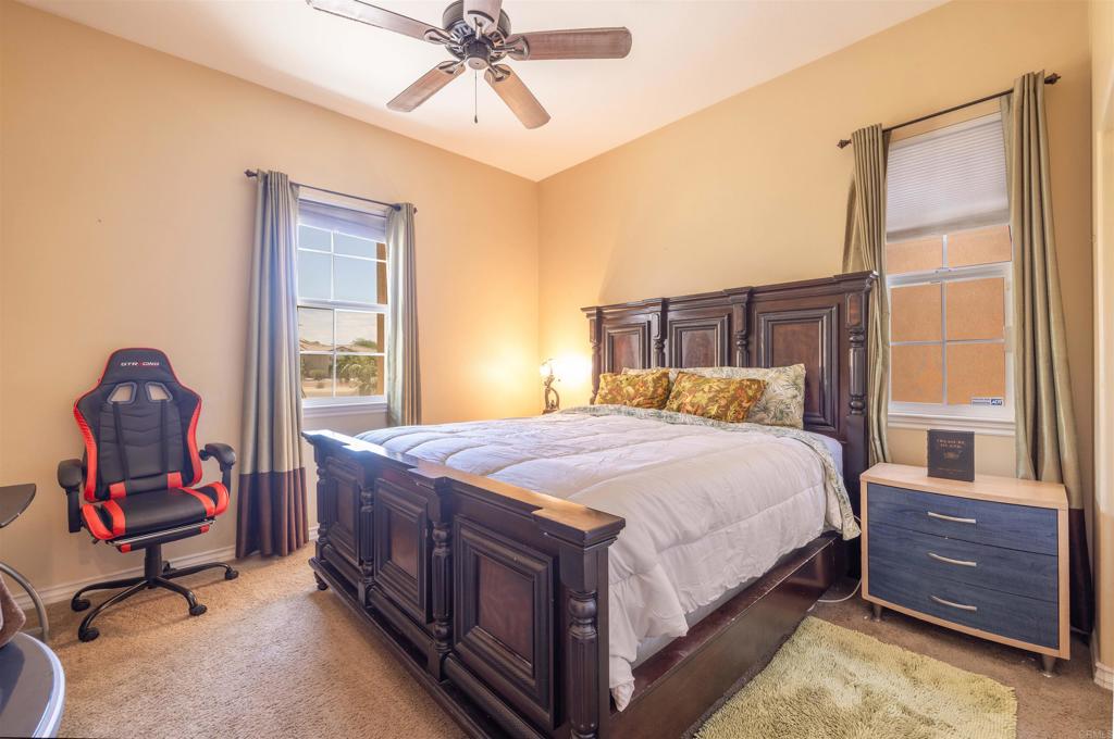 19506 Arcata Road Apple Valley, CA 92307 - Photo 18 of 34 Bedroom featuring offering comfort, privacy, and convenience.