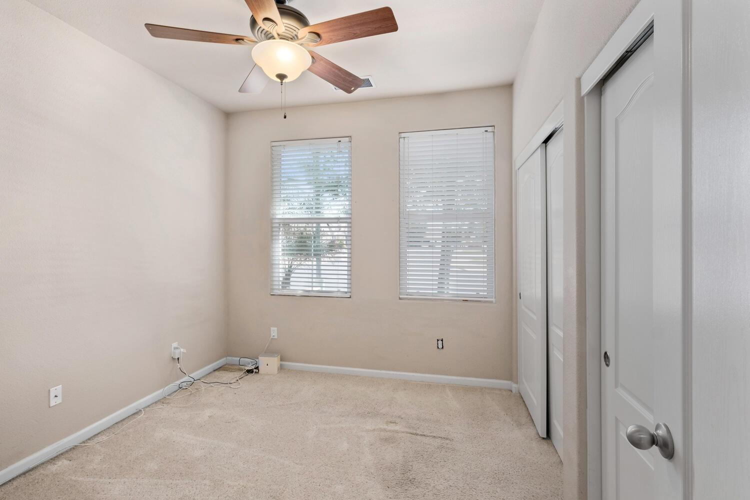 1182 Carson Avenue Clovis, CA 93611 - Photo 18 of 38 a view of an empty room with a window